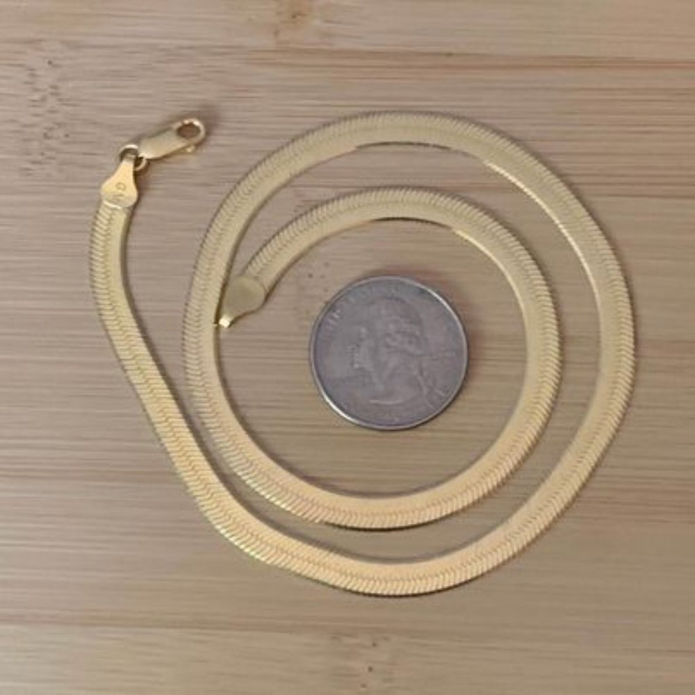 18k gold filled herringbone necklace. Double sided diamond cut.
